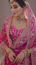 Load and play video in Gallery viewer, Rani Pink Bridal Lehenga

